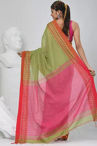 Green and pink handspun cotton saree with vibrant borders