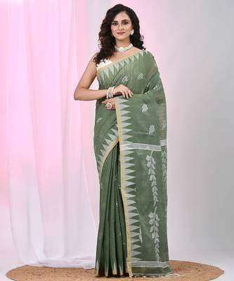 Handspun cotton saree in sage green with leaf and geometric patterns 1