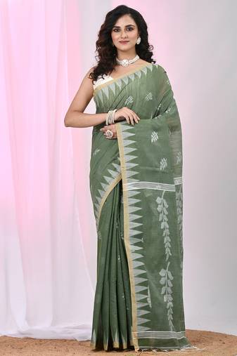 Handspun cotton saree in sage green with leaf and geometric patterns