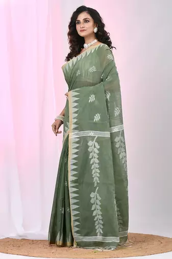 Handspun cotton saree in sage green with leaf and geometric patterns