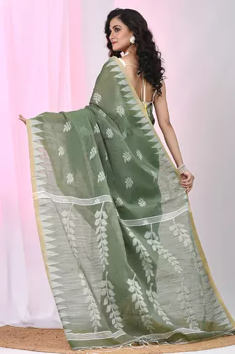 Handspun cotton saree in sage green with leaf and geometric patterns