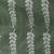 Handspun cotton saree in sage green with leaf and geometric patterns