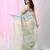 Mint green handspun cotton saree in soft pastels with striped design
