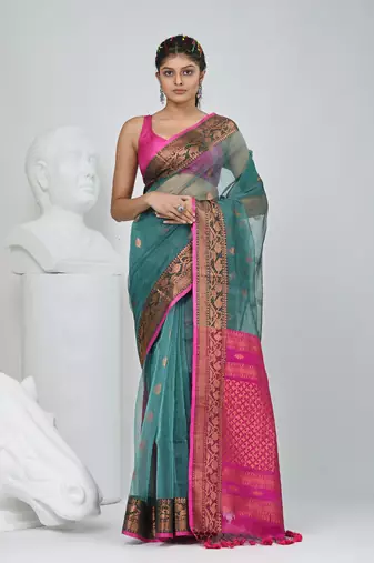 Elegant teal and fuchsia resham saree with zari border