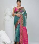 Elegant teal and fuchsia resham saree with zari border