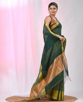 Elegant green and gold linen saree with striped borders 2