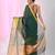 Elegant green and gold linen saree with striped borders
