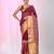 Elegant magenta and gold linen saree with striped borders