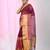 Elegant magenta and gold linen saree with striped borders