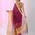 Elegant magenta and gold linen saree with striped borders