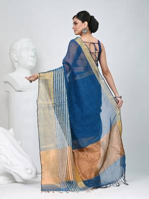 Elegant sapphire blue and gold linen saree with striped borders 3