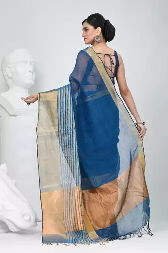 Elegant sapphire blue and gold linen saree with striped borders