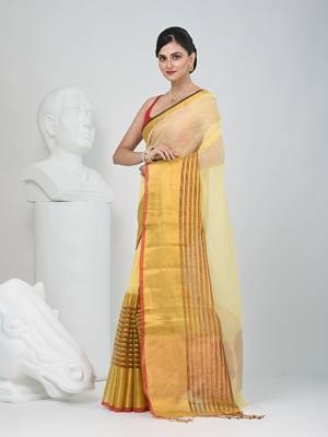 Elegant yellow and gold linen saree with striped borders 2