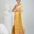 Elegant yellow and gold linen saree with striped borders
