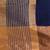 Elegant blue and gold linen saree with striped borders