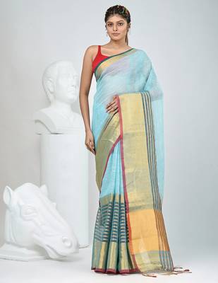 Elegant sky blue and gold linen saree with striped borders 1