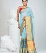Elegant sky blue and gold linen saree with striped borders