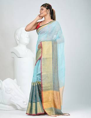 Elegant sky blue and gold linen saree with striped borders 2