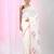 White linen saree with pink bird & texture motifs and zari borders