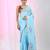 Sky blue linen saree with pink bird & texture motifs and zari borders
