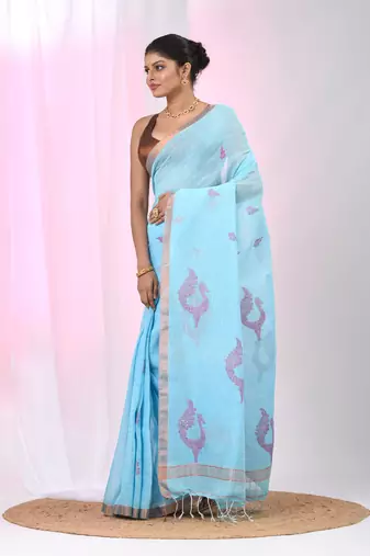 Sky blue linen saree with pink bird & texture motifs and zari borders