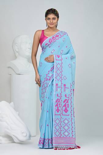 Sky blue cotton saree with traditional woven patterns and tassel border