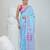 Sky blue cotton saree with traditional woven patterns and tassel border