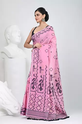 Pink cotton saree with traditional woven patterns and tassel border