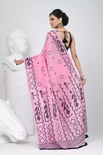 Pink cotton saree with traditional woven patterns and tassel border
