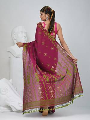 Magenta cotton saree with traditional woven patterns and tassel border 3