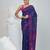 Blue cotton saree with traditional woven patterns and tassel border