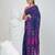 Blue cotton saree with traditional woven patterns and tassel border