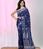Navy blue cotton saree with traditional woven patterns and tassel border