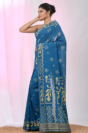 Sapphire blue cotton saree with traditional woven patterns and tassel border