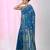 Sapphire blue cotton saree with traditional woven patterns and tassel border