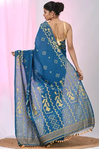 Sapphire blue cotton saree with traditional woven patterns and tassel border