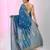 Sapphire blue cotton saree with traditional woven patterns and tassel border