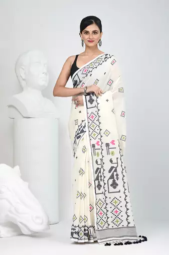 Off white cotton saree with traditional woven patterns and tassel border