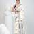 Off white cotton saree with traditional woven patterns and tassel border