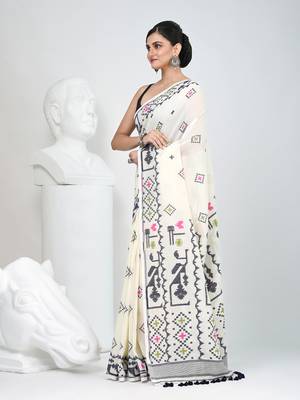 Off white cotton saree with traditional woven patterns and tassel border 2
