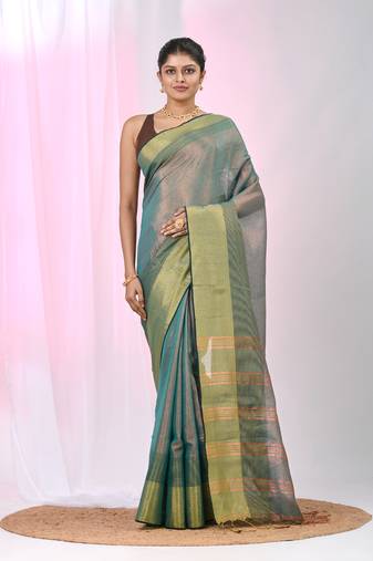 Elegant teal tissue saree with contrasting golden border