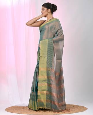 Elegant teal tissue saree with contrasting golden border 2