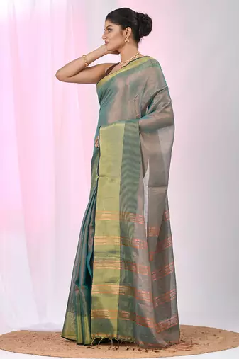 Elegant teal tissue saree with contrasting golden border