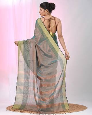 Elegant teal tissue saree with contrasting golden border 3