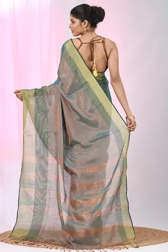 Elegant teal tissue saree with contrasting golden border
