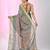Elegant teal tissue saree with contrasting golden border