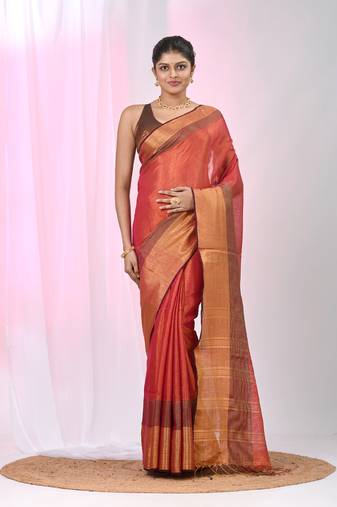 Elegant red tissue saree with contrasting golden border