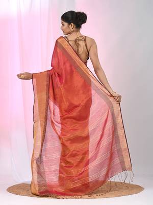 Elegant red tissue saree with contrasting golden border 3