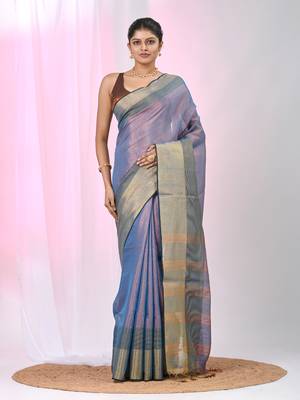 Elegant blue tissue saree with contrasting golden border 1