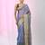 Elegant blue tissue saree with contrasting golden border
